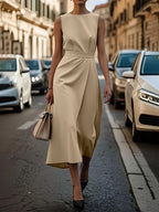 Summer ladies' fashionable, simple and solid color long dress with round neck and sleeveless waist design is suitable for daily commuting and vacation.