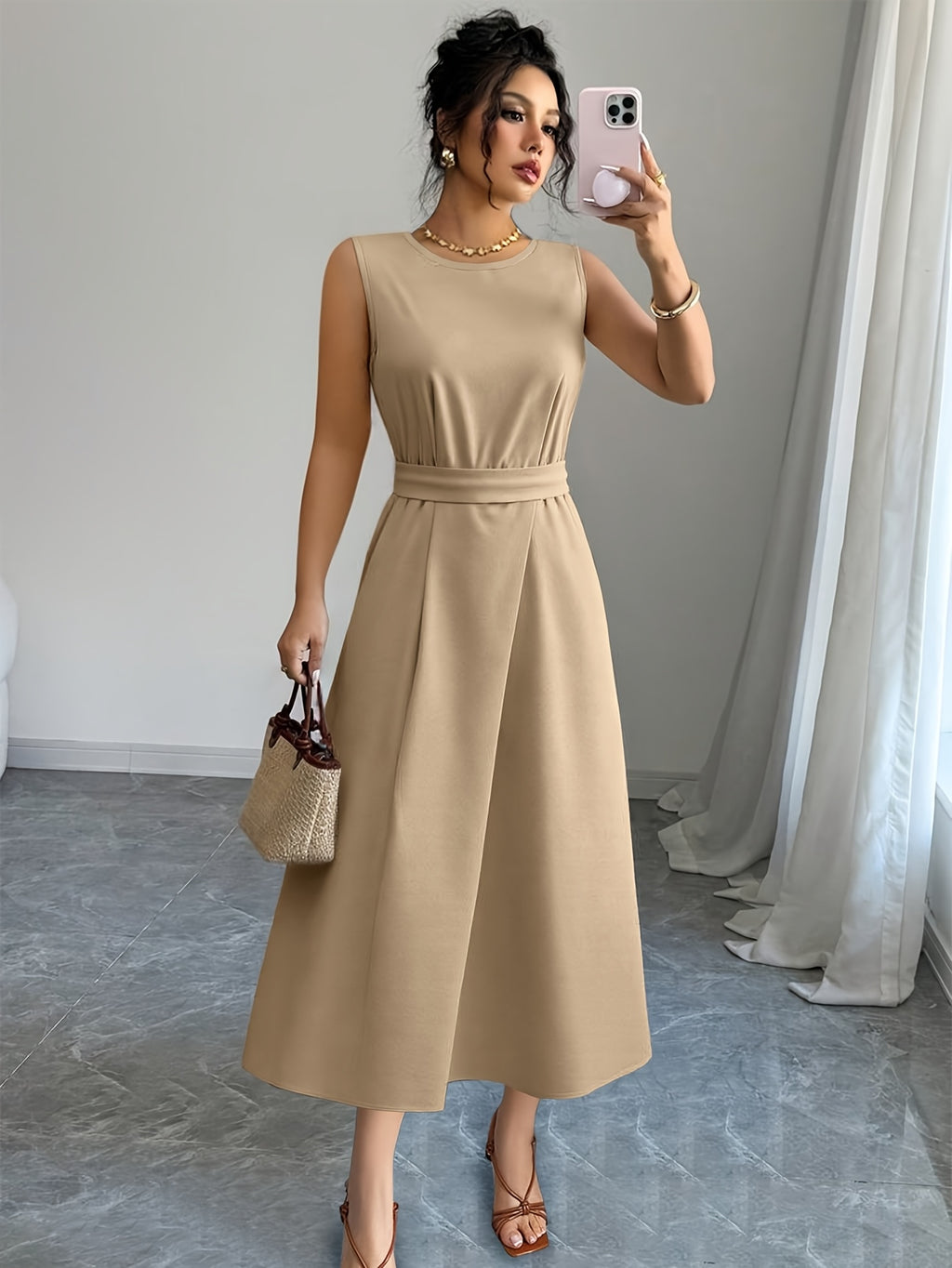 Summer ladies' fashionable, simple and solid color long dress with round neck and sleeveless waist design is suitable for daily commuting and vacation.